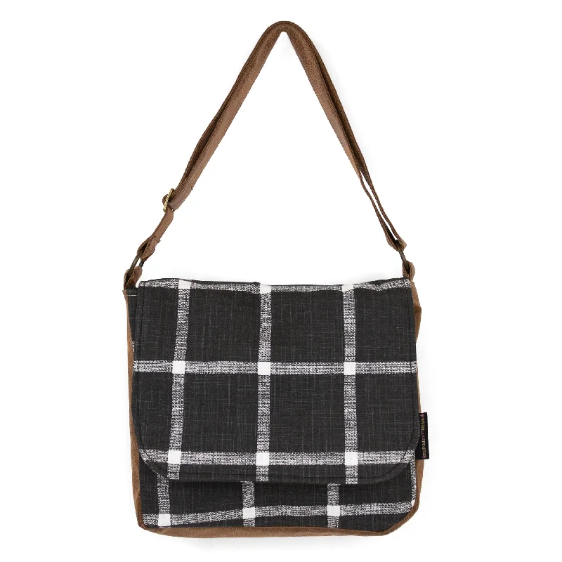 Waterproof crossbody bag with a zippered closure for outdoor adventuresErika: Gridwork Waterproof crossbody bag with a zippered closure for outdoor adventuresErika: Gridwork