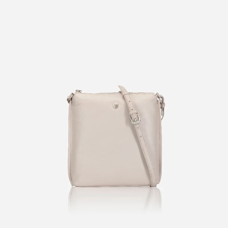 Crossbody bag with a magnetic snap closure for quick accessOsaka Essentials Crossbody Bag, Pebble Crossbody bag with a magnetic snap closure for quick accessOsaka Essentials Crossbody Bag, Pebble