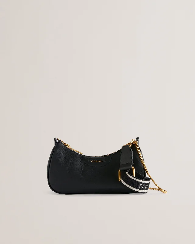 Canvas crossbody bag with a patchwork design for a casual and artsy feelEssiy Webbing Leather Crossbody Bag Black Canvas crossbody bag with a patchwork design for a casual and artsy feelEssiy Webbing Leather Crossbody Bag Black