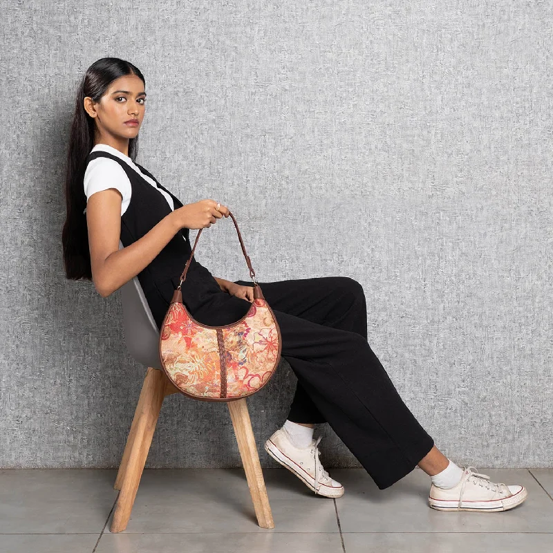 Laser - cut leather evening bag with an intricate patternFloLov Hobo Bag