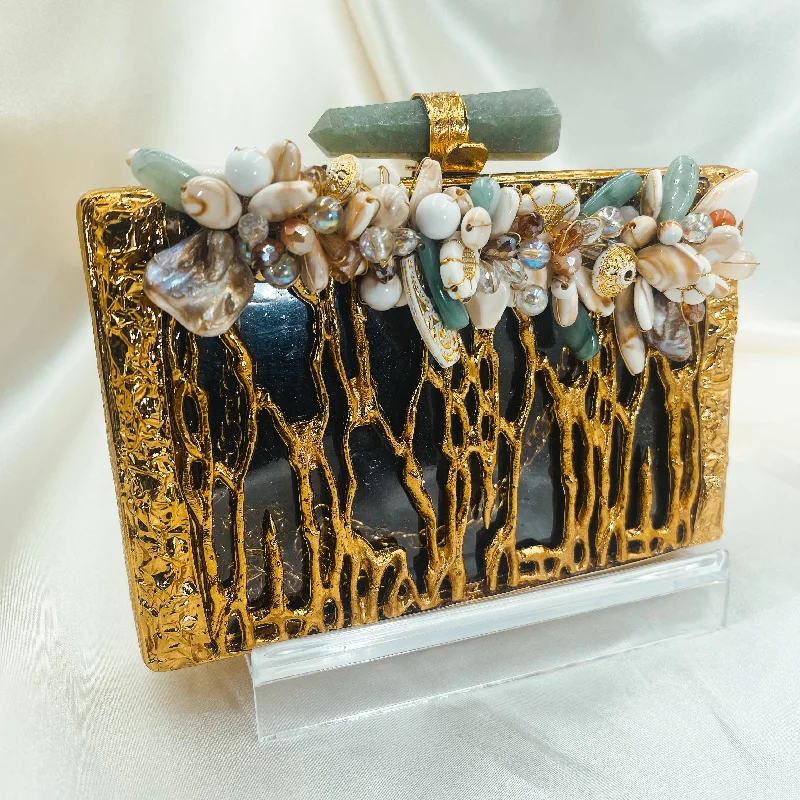 Velvet clutch with a tassel detail for a bohemian - chic styleGARDEN Clutch