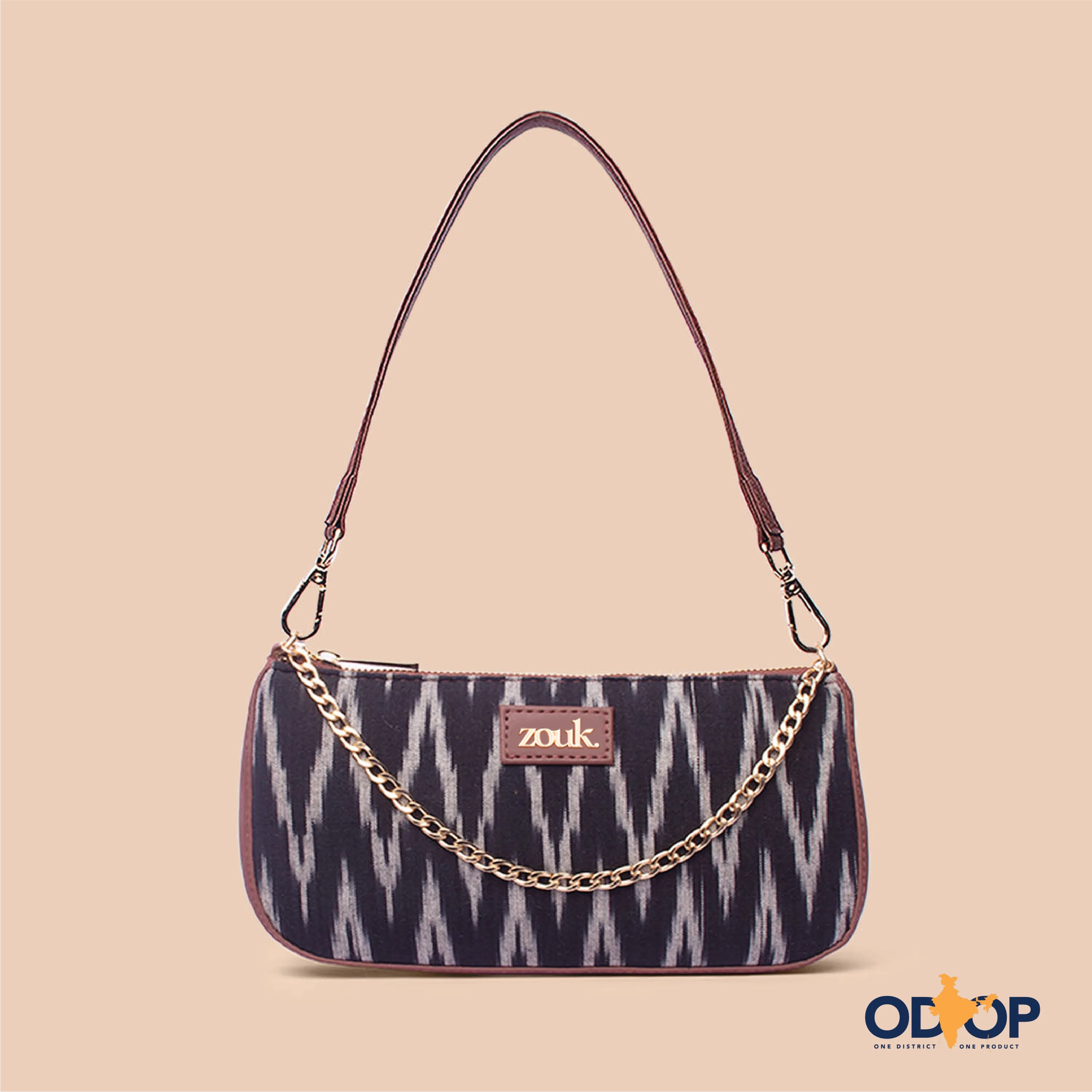 Monogrammed clutch as a personalized evening accessoryIkat Wave Baguette