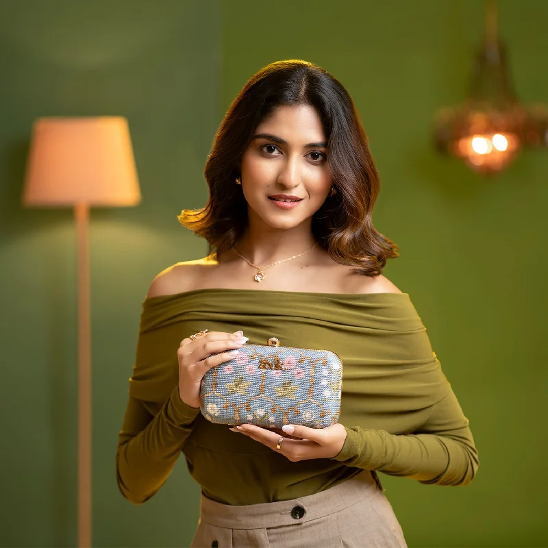 Fur - trimmed evening bag for a luxurious winter eventJaipur Fresco Blue Clutch