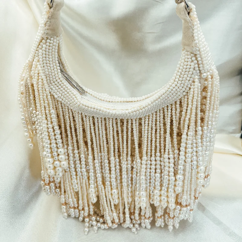 Metallic leather evening bag with a textured finishJESSICA Sling Bag