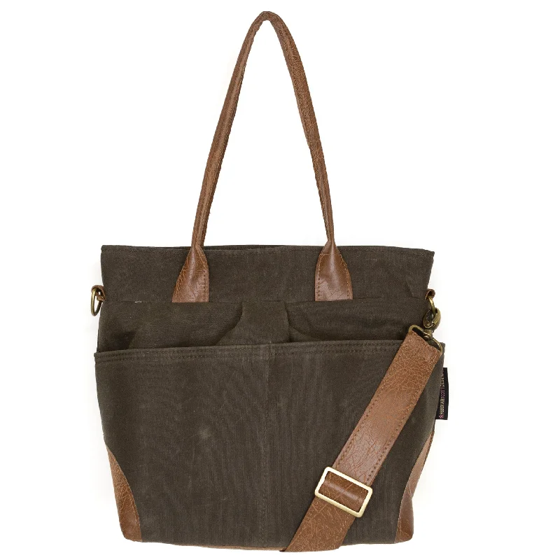 Studded crossbody bag with a punk - rock edgeJill Premier: Olive Waxed Canvas