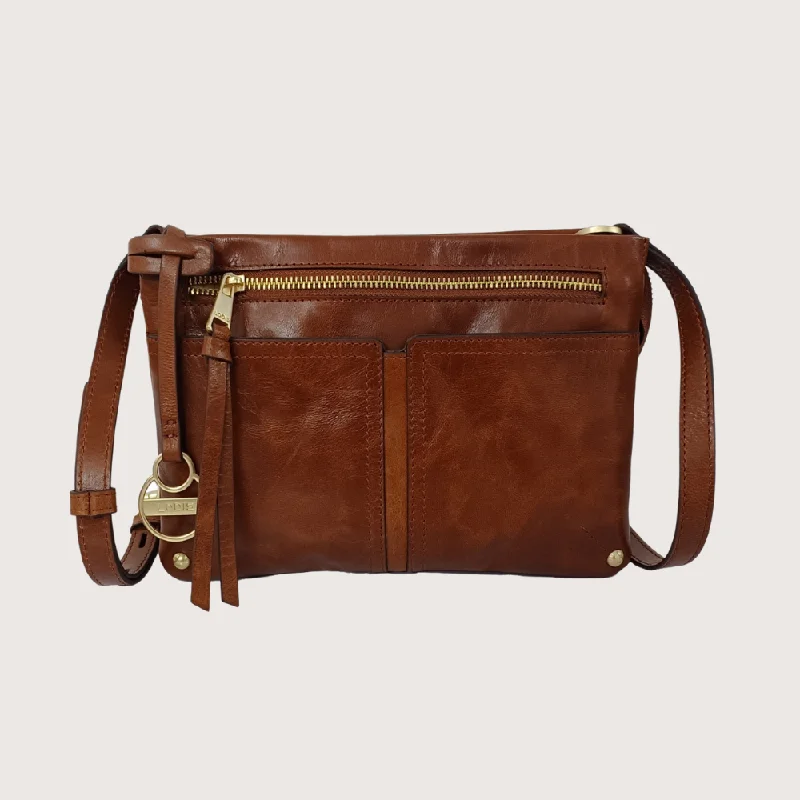 Lightweight nylon crossbody bag with a floral print for spring outingsKENDALL CROSSBODY Lightweight nylon crossbody bag with a floral print for spring outingsKENDALL CROSSBODY