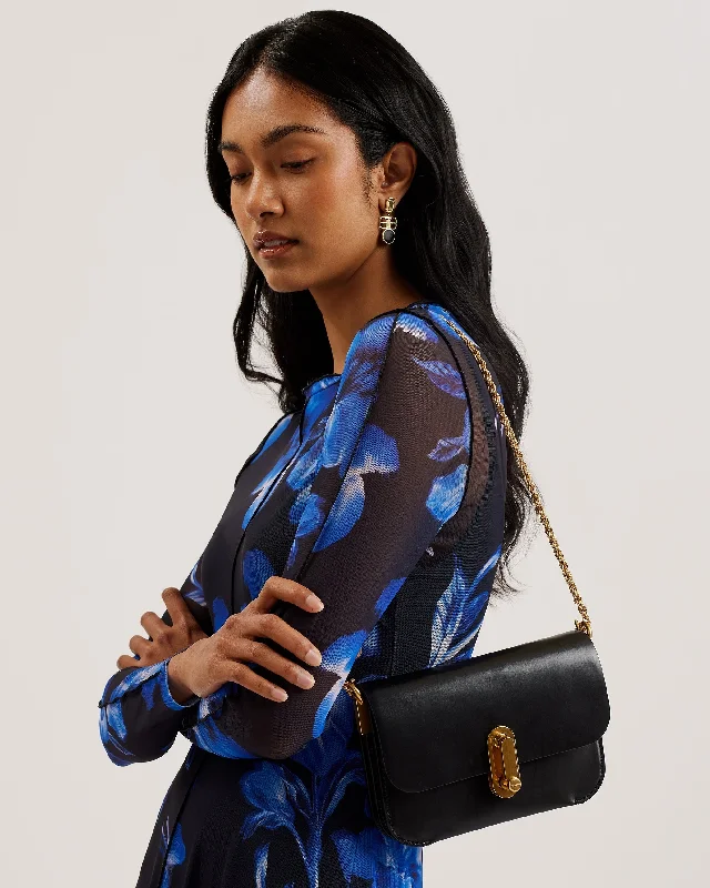Embroidered crossbody bag with intricate beadwork for a unique touchKkaysa Polished Small Leather Crossbody Bag Black Embroidered crossbody bag with intricate beadwork for a unique touchKkaysa Polished Small Leather Crossbody Bag Black