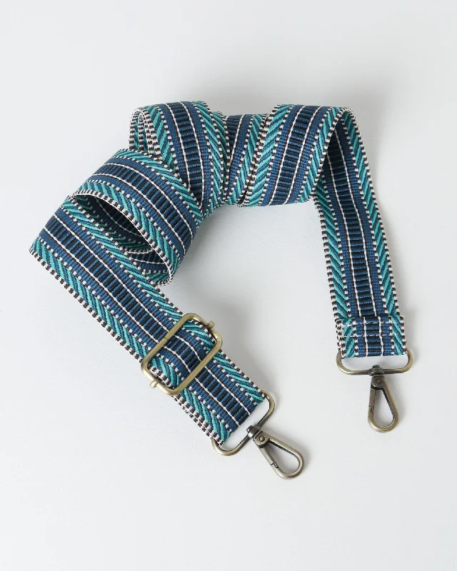 Crossbody bag with a magnetic snap closure for quick accessLadder Stripe Strap - Blue