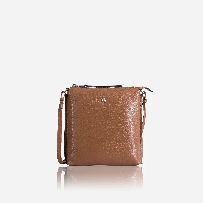 Crossbody bag with a detachable strap for easy customizationEssentials Crossbody Bag