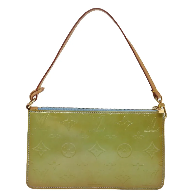 Laser - cut leather evening bag with an intricate patternLouis Vuitton Pochette Accessoire  Leather Clutch Bag (Pre-Owned)
