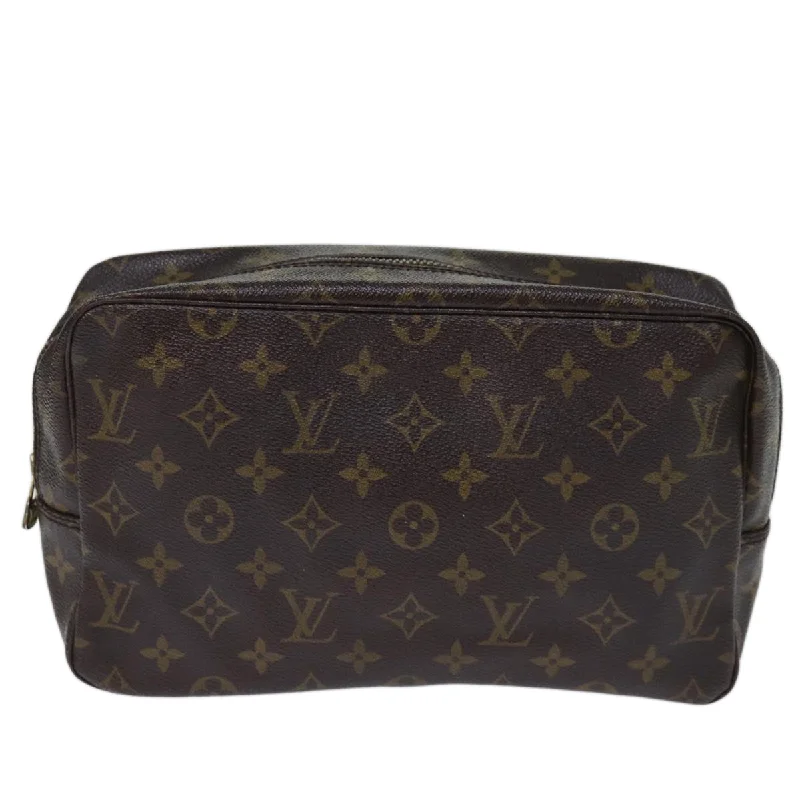 Leather evening bag with a gold - plated chain strap for a sophisticated lookLouis Vuitton Trousse De Toilette Canvas Clutch Bag (Pre-Owned) Leather evening bag with a gold - plated chain strap for a sophisticated lookLouis Vuitton Trousse De Toilette Canvas Clutch Bag (Pre-Owned)