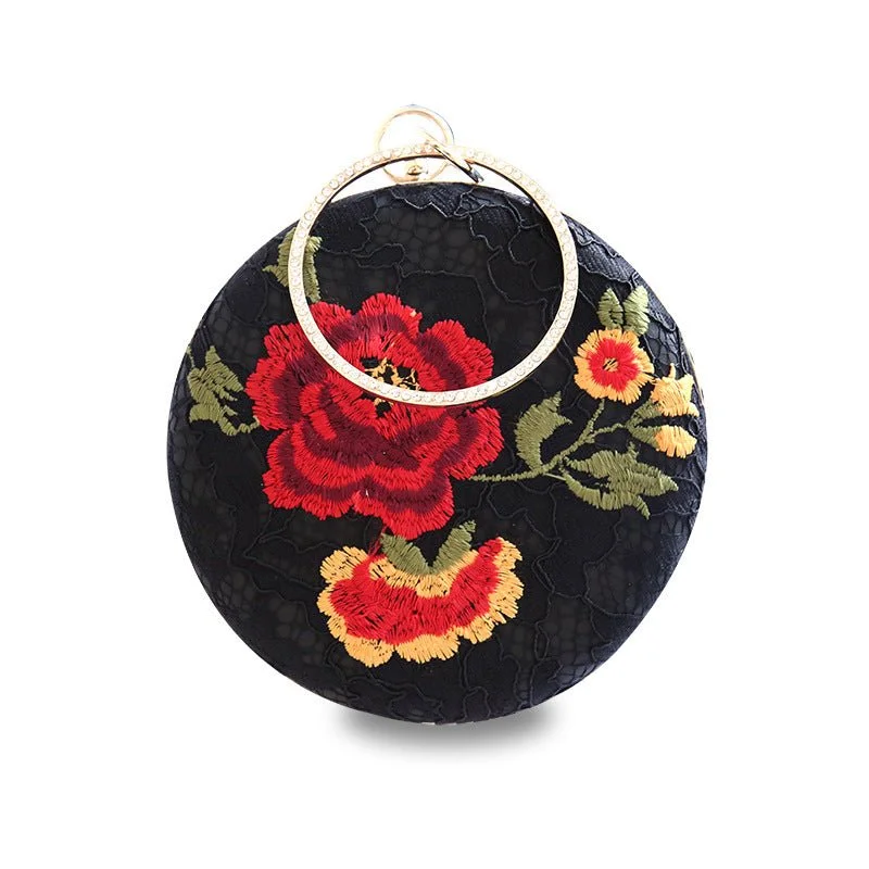 Laser - cut leather evening bag with an intricate patternLuxy Moon Embroidered Round Flower Black Evening Bag Laser - cut leather evening bag with an intricate patternLuxy Moon Embroidered Round Flower Black Evening Bag