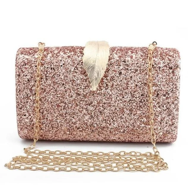 Velvet clutch with a tassel detail for a bohemian - chic styleLuxy Moon Sequin Evening Bags Glitter Leaf Decoration Clutches Velvet clutch with a tassel detail for a bohemian - chic styleLuxy Moon Sequin Evening Bags Glitter Leaf Decoration Clutches