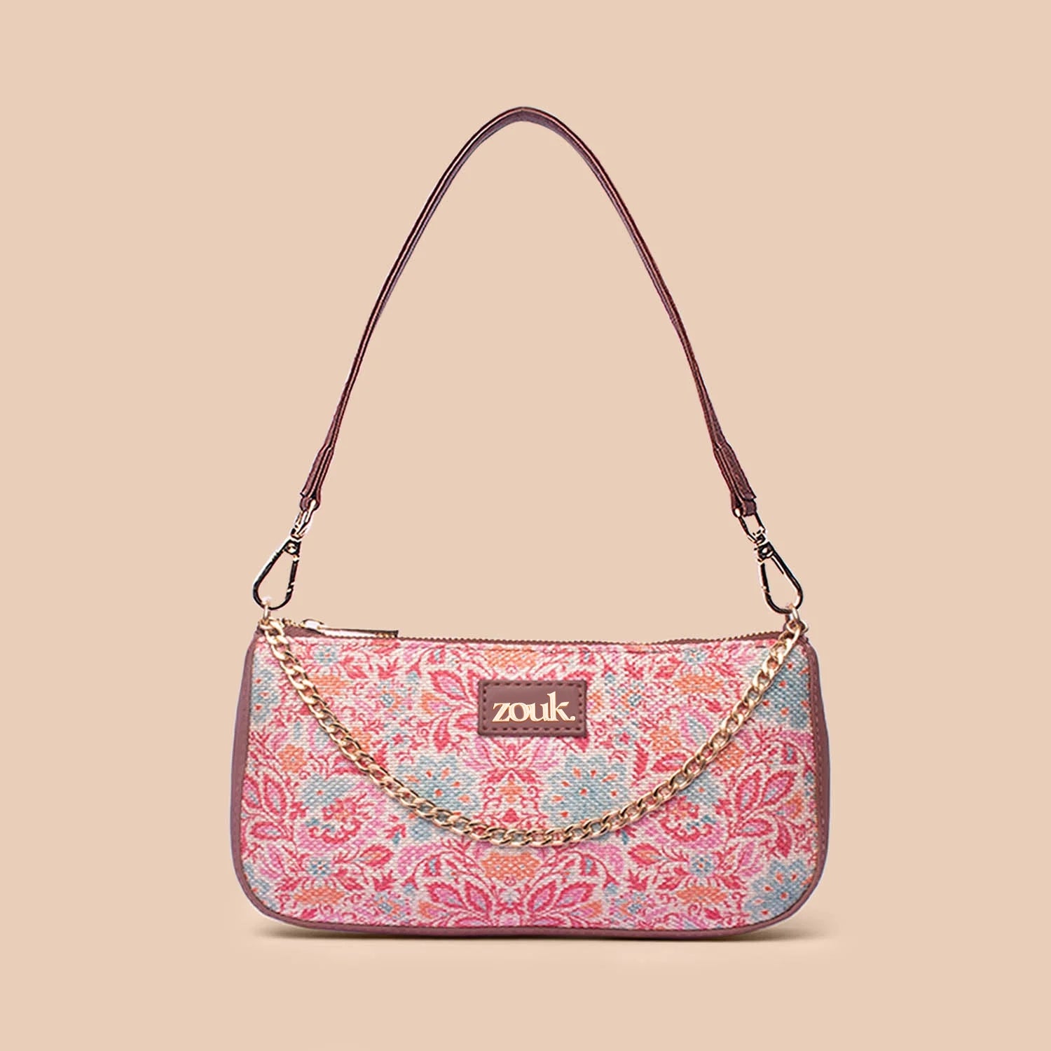 Metallic leather evening bag with a textured finishMangalore Blossoms Baguette