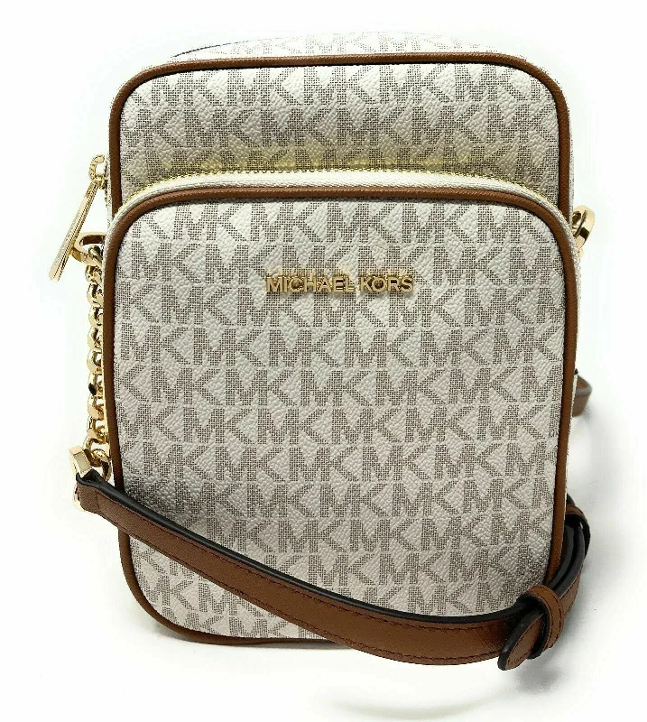 Crossbody bag with a detachable strap for easy customizationMichael Kors Jet Set Travel Signature Logo Chain Crossbody F Bag Crossbody bag with a detachable strap for easy customizationMichael Kors Jet Set Travel Signature Logo Chain Crossbody F Bag
