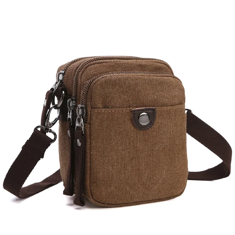 Crossbody bag with a magnetic snap closure for quick accessMini Vintage Unisex Canvas Messenger Bag Crossbody bag with a magnetic snap closure for quick accessMini Vintage Unisex Canvas Messenger Bag