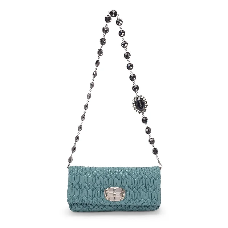 Patent leather clutch with a modern, minimalist designMiu Miu Mint Patent Matelasse Crystal Evening Bag Patent leather clutch with a modern, minimalist designMiu Miu Mint Patent Matelasse Crystal Evening Bag