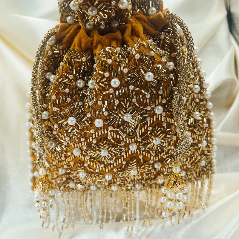 Vintage - style beaded evening bag with an art - deco patternNIA Potli (Gold)