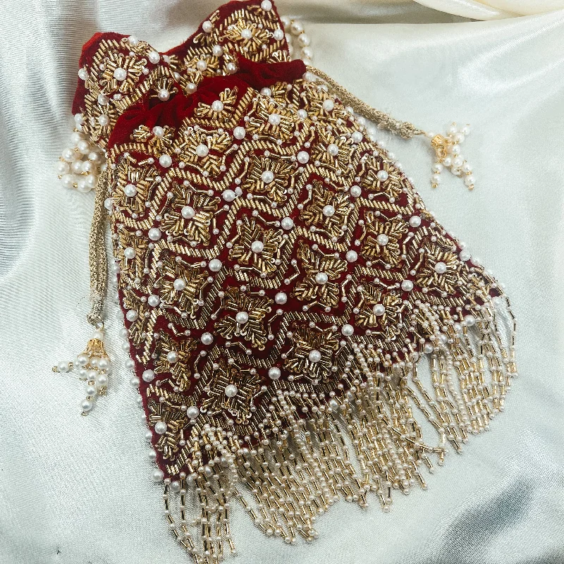 Floral - printed clutch for a spring or summer eveningNIA Potli (Red)