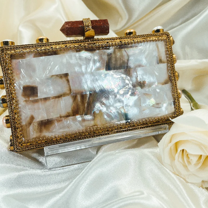 Patent leather clutch with a modern, minimalist designNOREEN Clutch