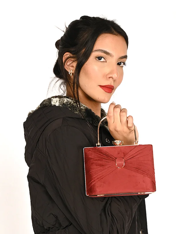 Embroidered silk clutch with a traditional motif for a cultural touchOdette Maroon Embellished Bridal Clutch For Women Embroidered silk clutch with a traditional motif for a cultural touchOdette Maroon Embellished Bridal Clutch For Women