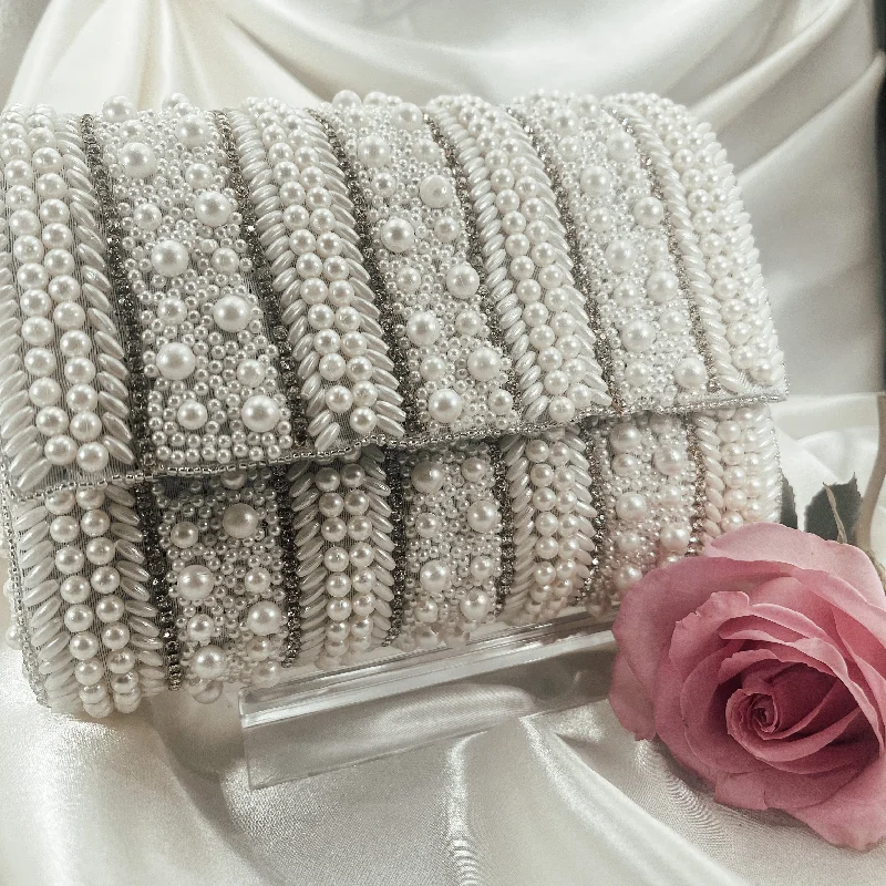 Fur - trimmed evening bag for a luxurious winter eventRIHANNA Handbag