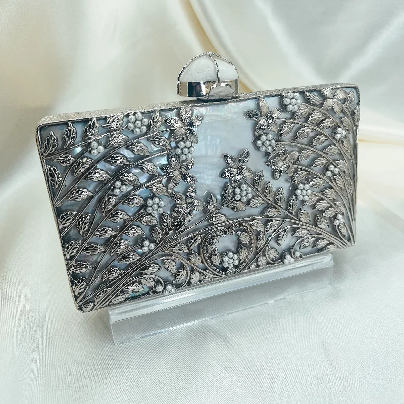 Laser - cut leather evening bag with an intricate patternRUHANA Clutch (Silver)