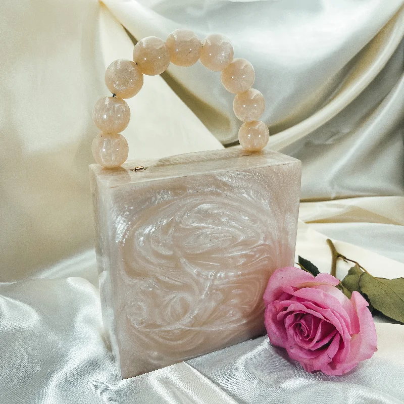 Mother - of - pearl clutch with a delicate sheenSAHAR Clutch (Beige)