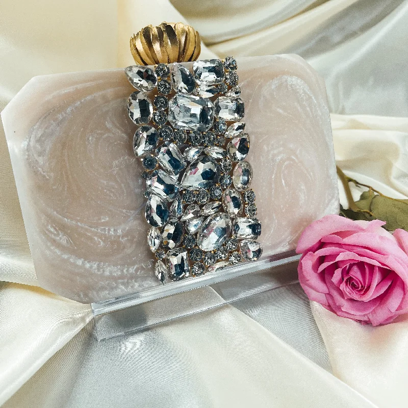 Clutch with a built - in mirror and compact for on - the - go touch - upsSHREYA Clutch Clutch with a built - in mirror and compact for on - the - go touch - upsSHREYA Clutch