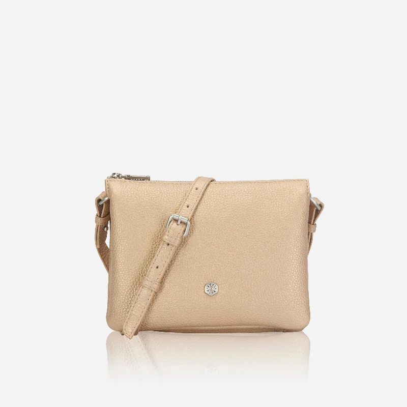 Canvas crossbody bag with a patchwork design for a casual and artsy feelSlim Ladies Leather Crossbody, Metallic Gold Canvas crossbody bag with a patchwork design for a casual and artsy feelSlim Ladies Leather Crossbody, Metallic Gold