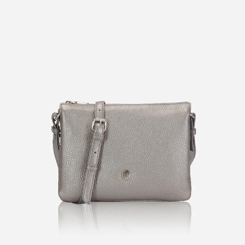 Crossbody bag with a magnetic snap closure for quick accessSlim Ladies Leather Crossbody, Metallic Silver Crossbody bag with a magnetic snap closure for quick accessSlim Ladies Leather Crossbody, Metallic Silver
