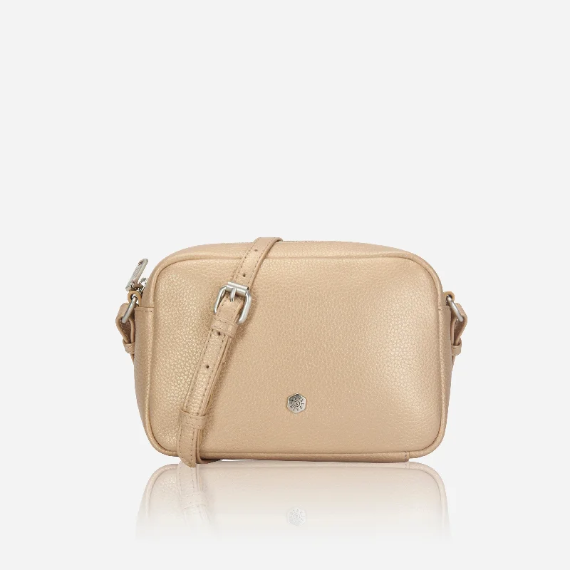 Crossbody bag with a magnetic snap closure for quick accessSmall Crossbody, Metallic Gold Crossbody bag with a magnetic snap closure for quick accessSmall Crossbody, Metallic Gold