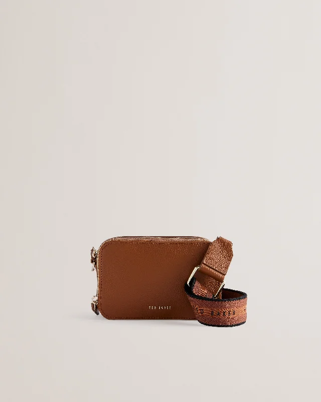 Waterproof crossbody bag with a zippered closure for outdoor adventuresStunna Webbing Leather Mini Crossbody Bag Brn-Choc Waterproof crossbody bag with a zippered closure for outdoor adventuresStunna Webbing Leather Mini Crossbody Bag Brn-Choc