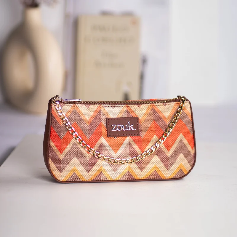 Velvet clutch with a tassel detail for a bohemian - chic styleTidal Wave Baguette