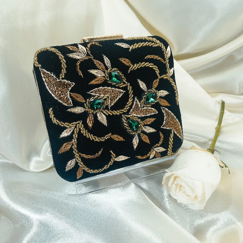 Sequined clutch in a metallic color for a party lookVANI Clutch