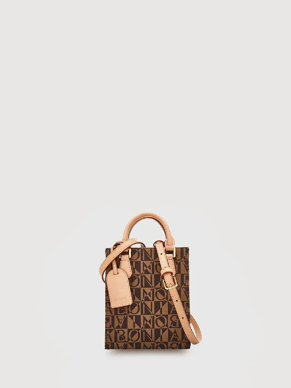 Crossbody bag with a magnetic snap closure for quick accessVeronica Monogram Petite Tote