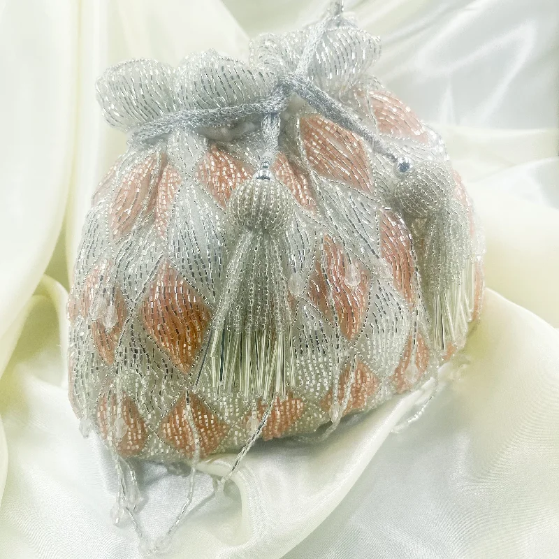 Laser - cut leather evening bag with an intricate patternZARA Potli